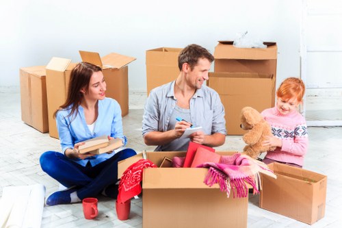 Household items and furniture organised for transport from Earls Court