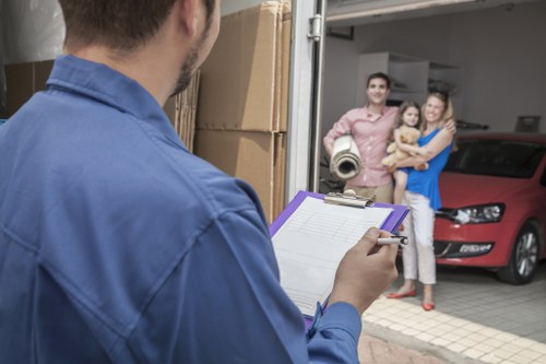 Local moving team handling boxes and household items in Earls Court