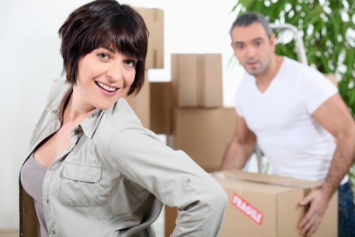 Local removals team preparing boxes and household items for transport