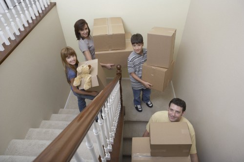 Packed boxes and furniture prepared for a move in Earls Court